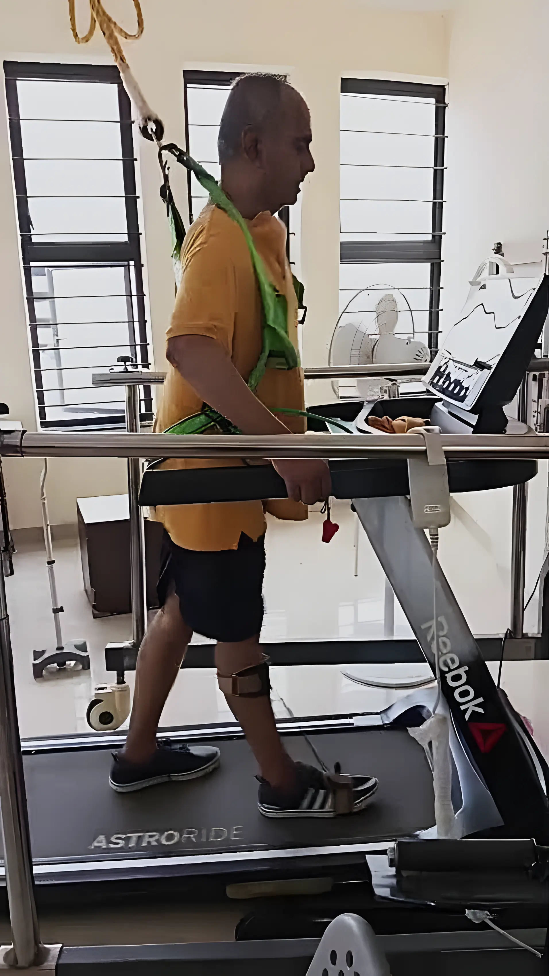 Physiotherapist assisting a Stroke patient with zero gravity gait training at Regen Neuro Rehabilitation Physiotherapy Centre