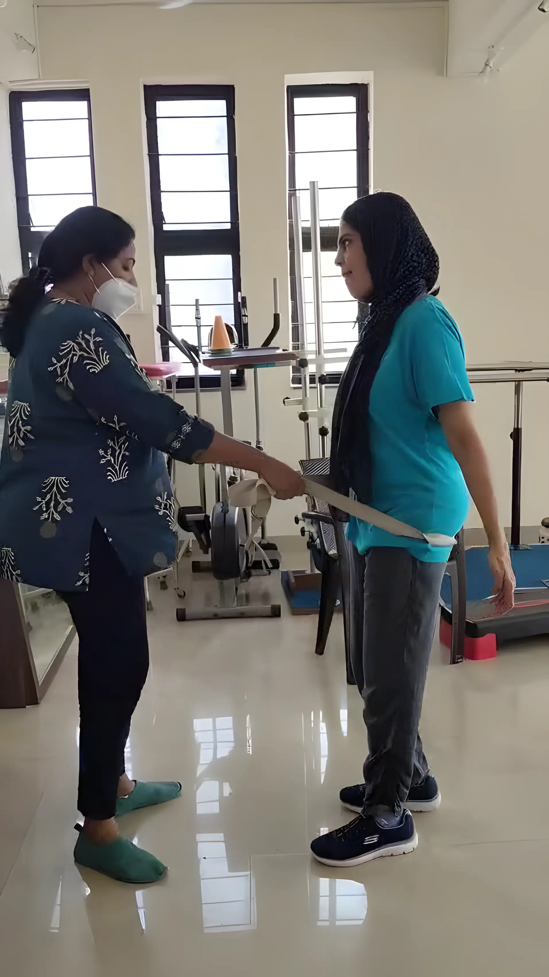 Physiotherapist assisting a Stroke patient with zero gravity gait training at Regen Neuro Rehabilitation Physiotherapy Centre
